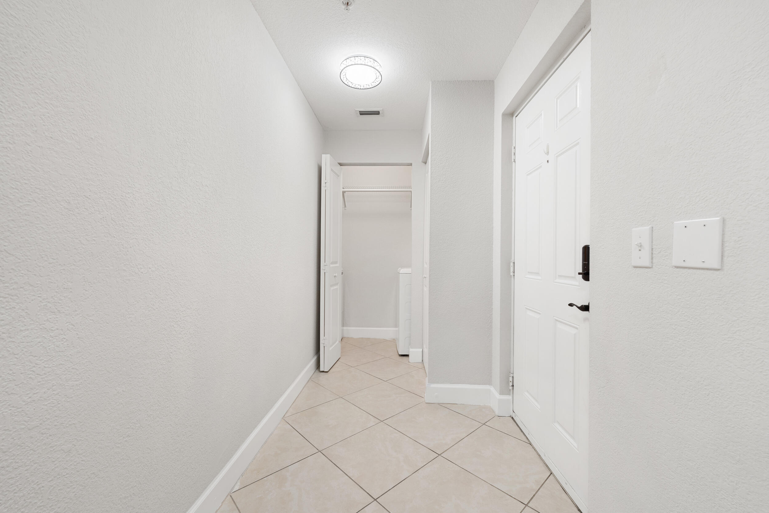 1690 Renaissance Commons Boulevard, Unit 1312 Boynton Beach, FL 33426 - Photo 17 of 39 a view of an empty room