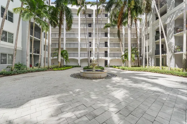 a living room with furniture and a fountain