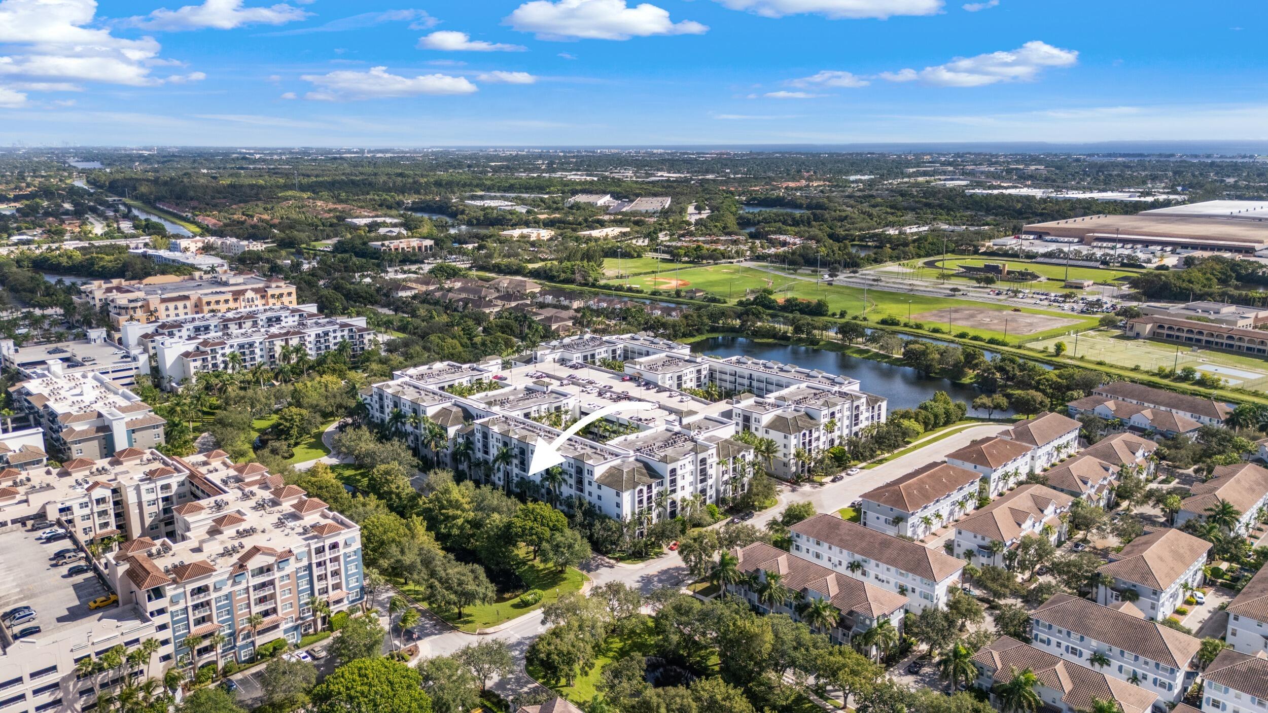 1690 Renaissance Commons Boulevard, Unit 1312 Boynton Beach, FL 33426 - Photo 35 of 39 a view of a city with an ocean