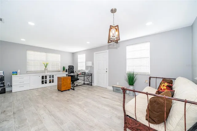 a living room with furniture and a window