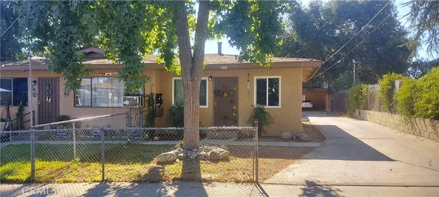 a view of a house with swimming pool