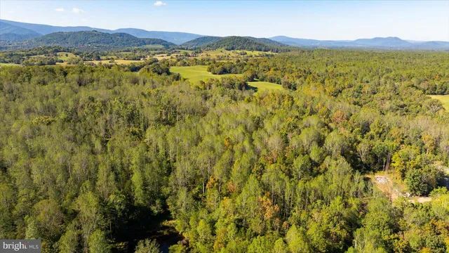 a view of lake and mountain