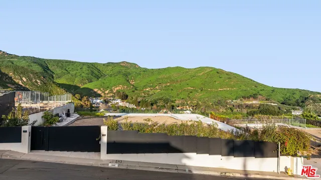 a view of lake with mountain