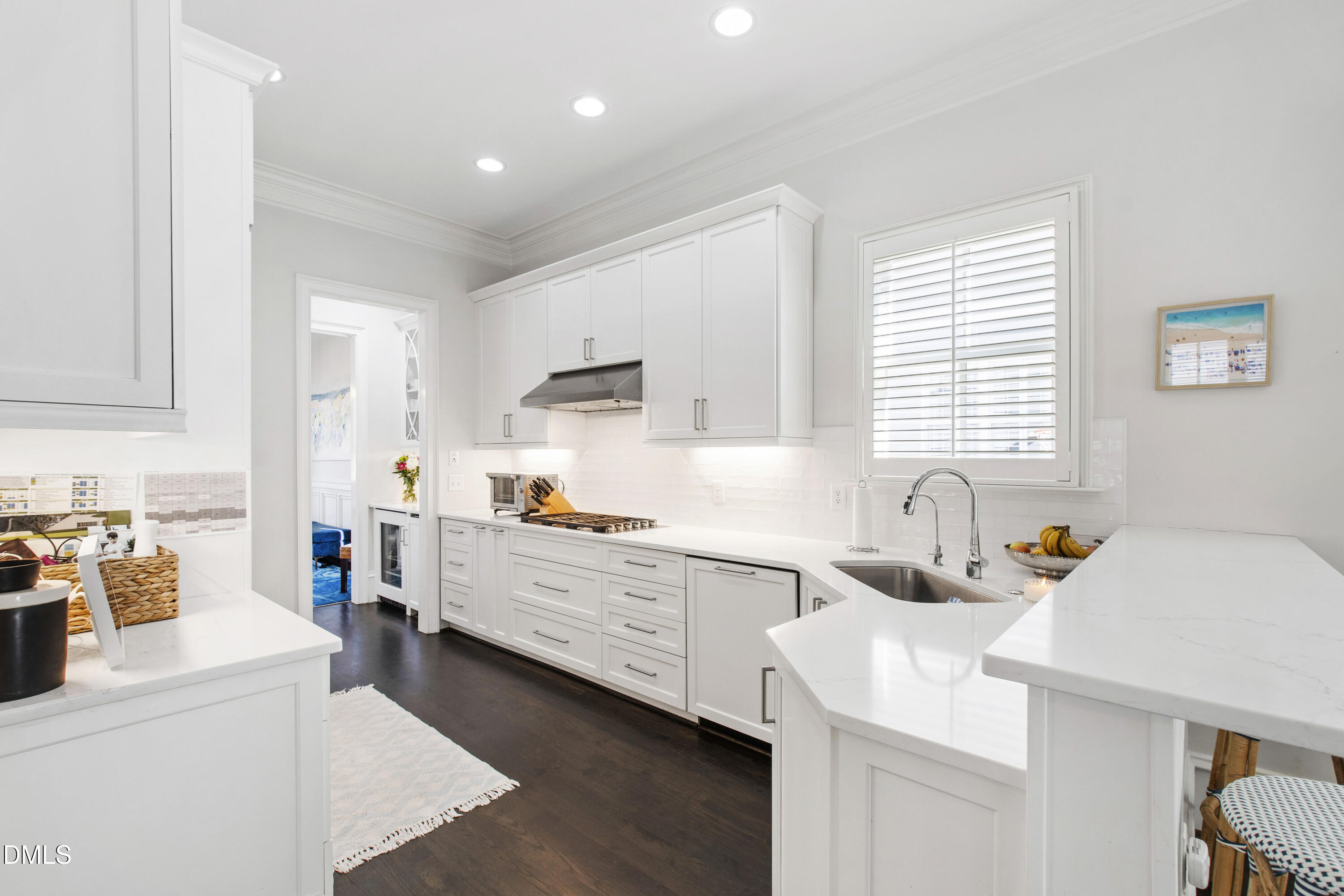 2615 Davis Street Raleigh, NC 27608 - Photo 14 of 61 a kitchen that has a sink and a stove in it