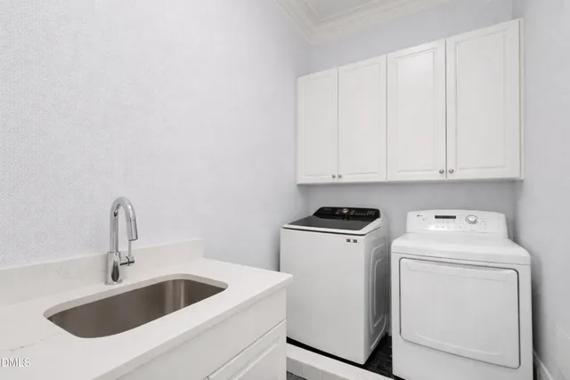 a bathroom with a tub a sink a mirror and a shower