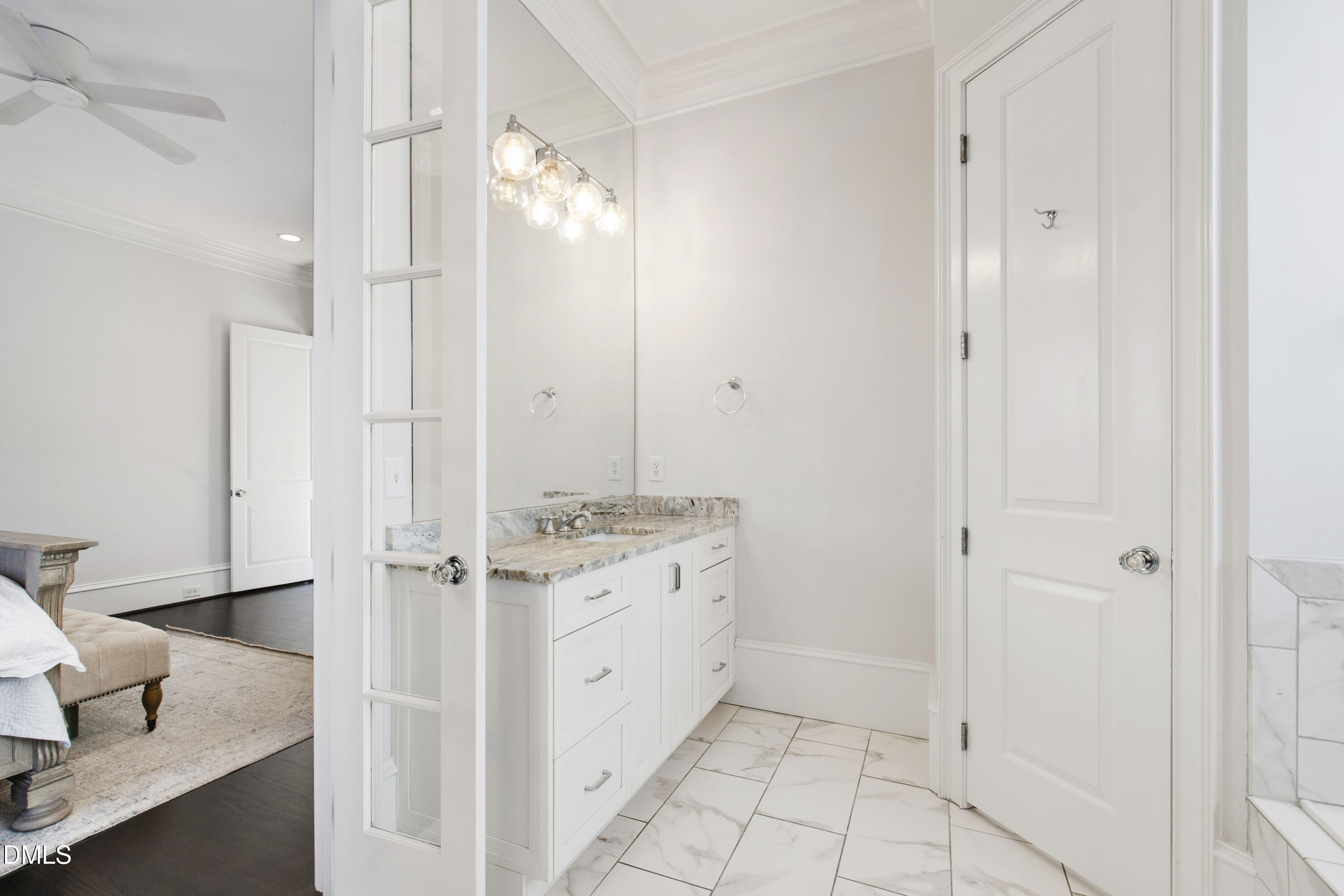 2615 Davis Street Raleigh, NC 27608 - Photo 28 of 61 a bathroom with a granite countertop sink a mirror and a shower