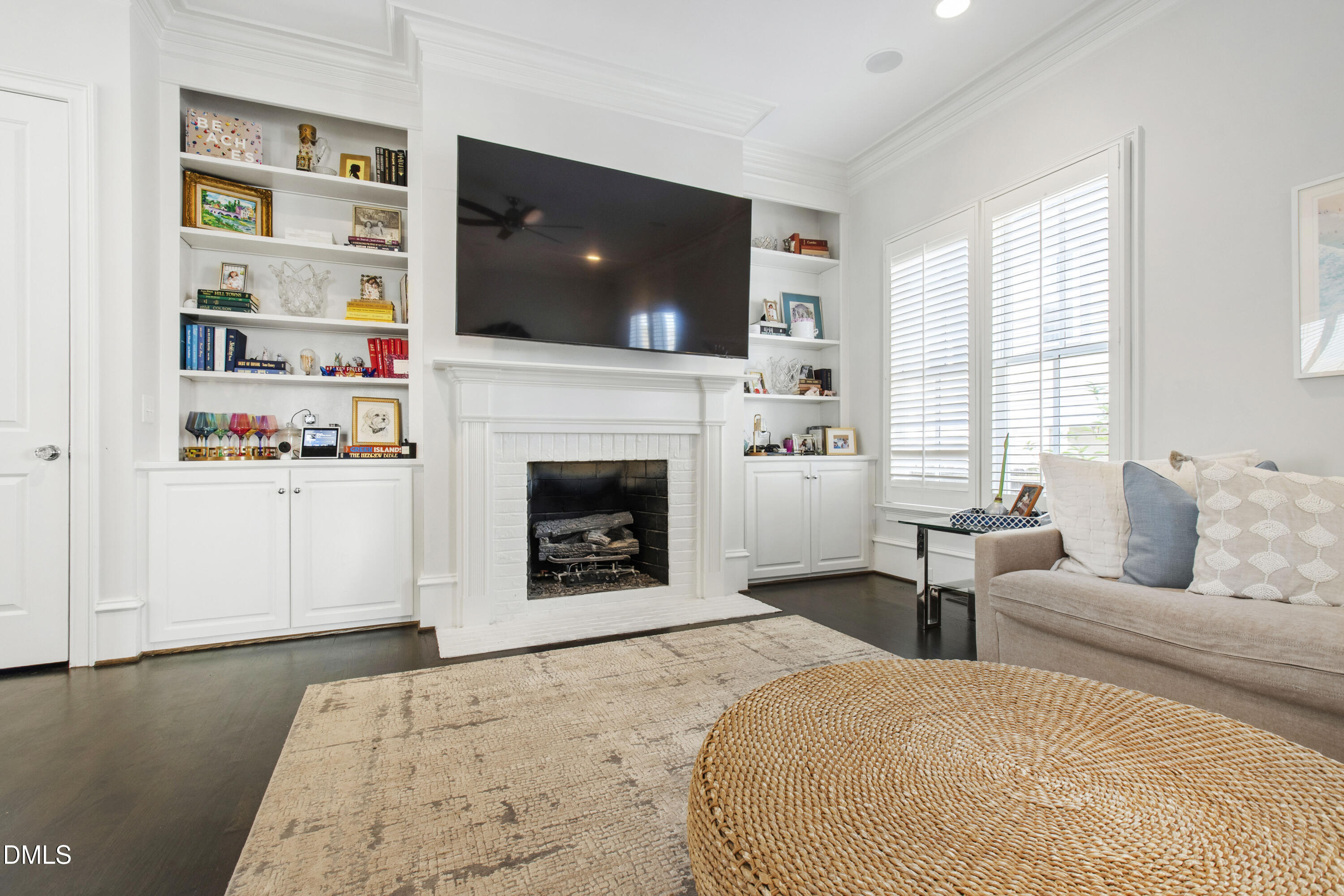 2615 Davis Street Raleigh, NC 27608 - Photo 33 of 61 a bedroom with a large bed and a fireplace