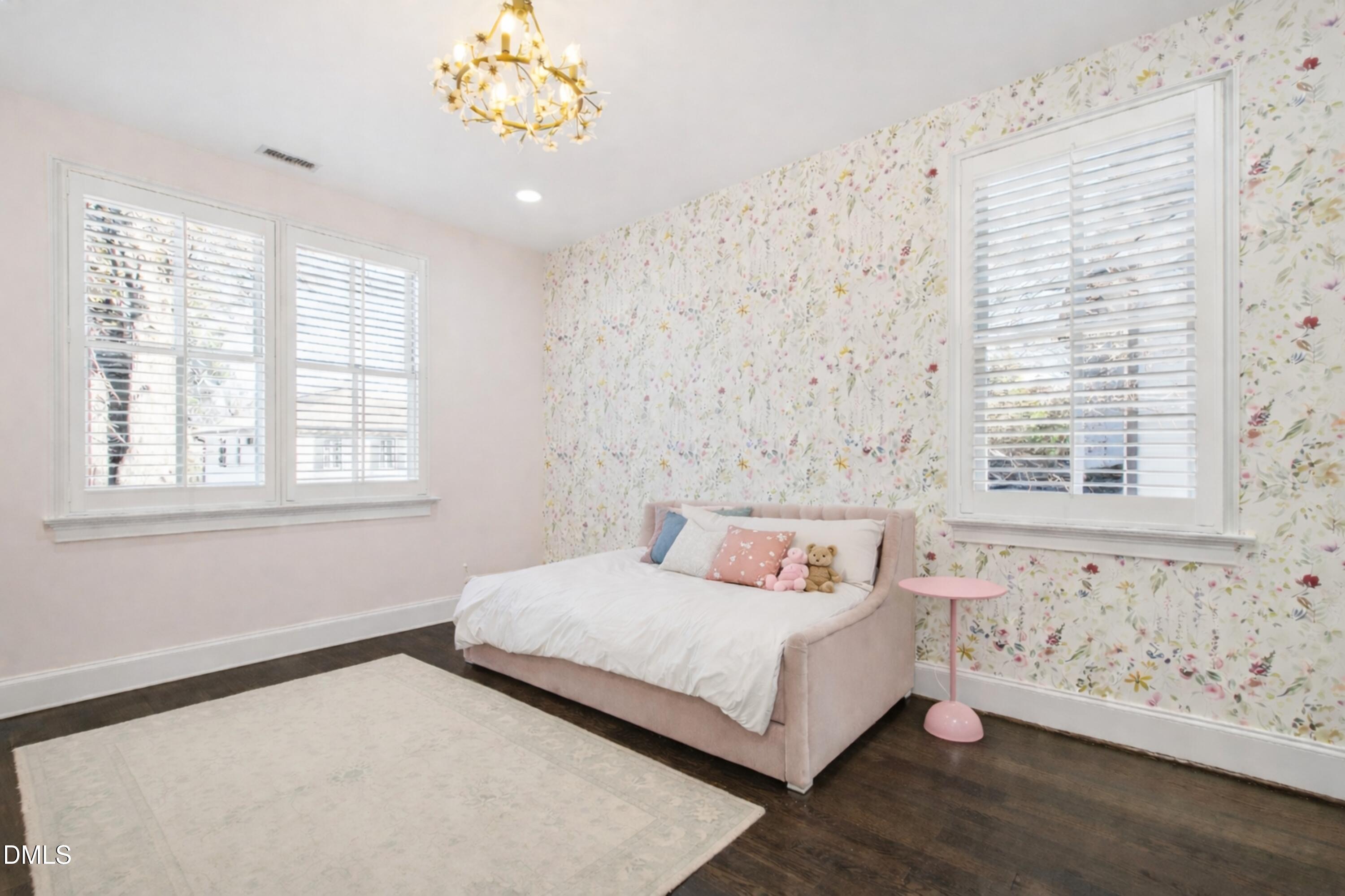 2615 Davis Street Raleigh, NC 27608 - Photo 36 of 61 a bedroom with a bed and a window