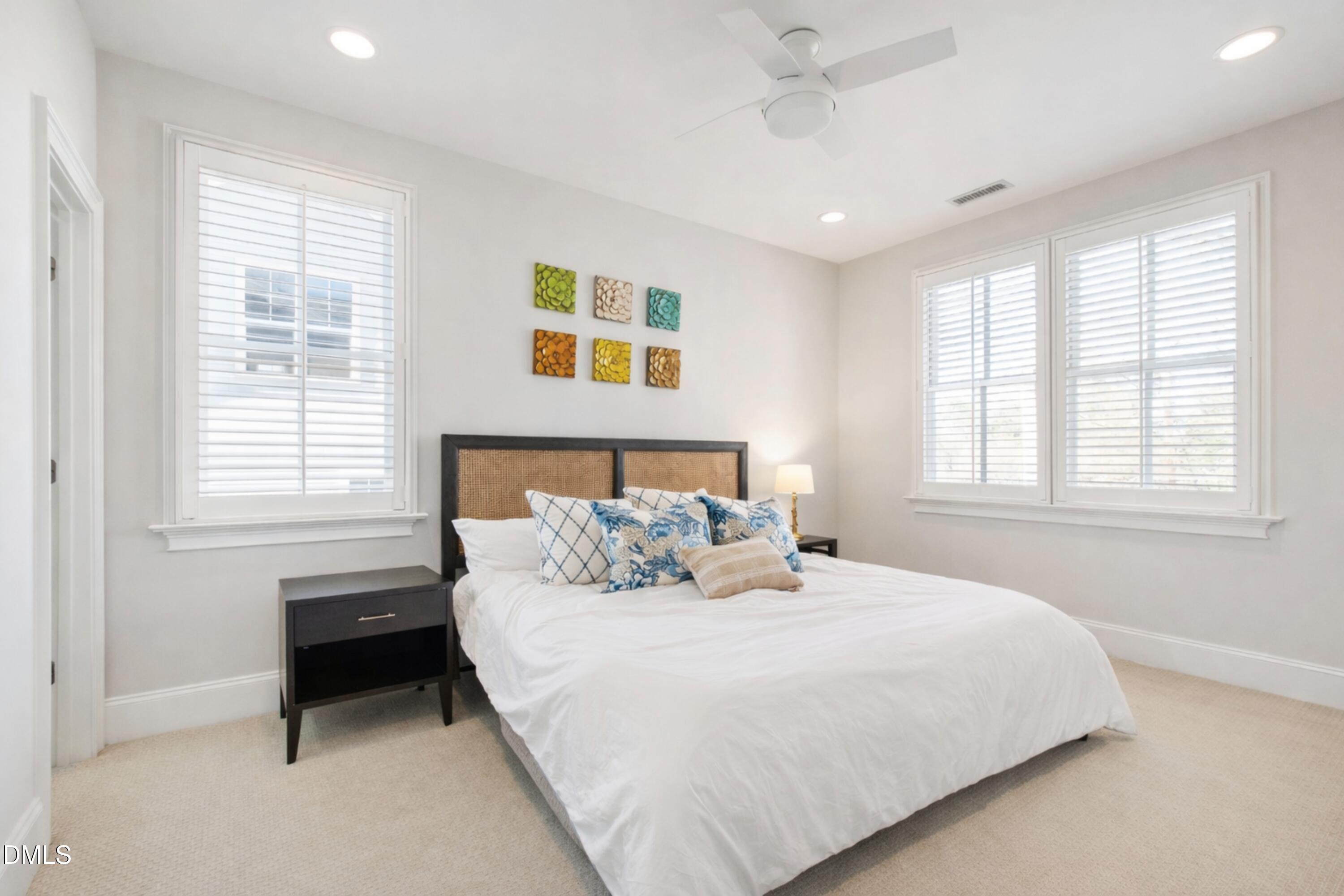 2615 Davis Street Raleigh, NC 27608 - Photo 41 of 61 a bedroom with a bed and a window