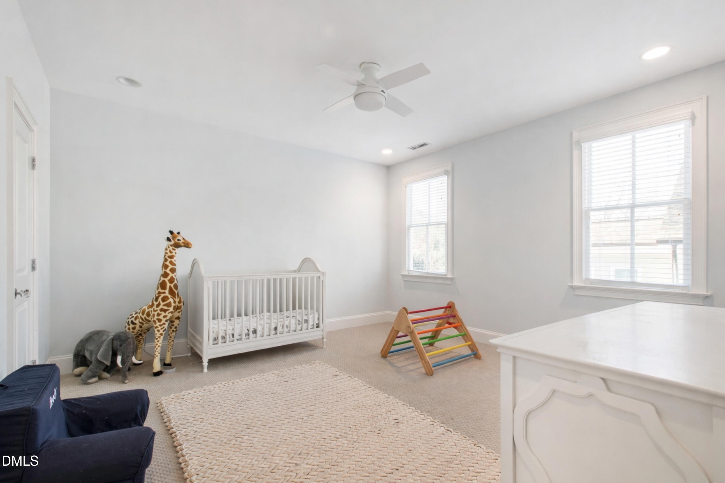 2615 Davis Street Raleigh, NC 27608 - Photo 45 of 61 a bedroom with furniture and a window