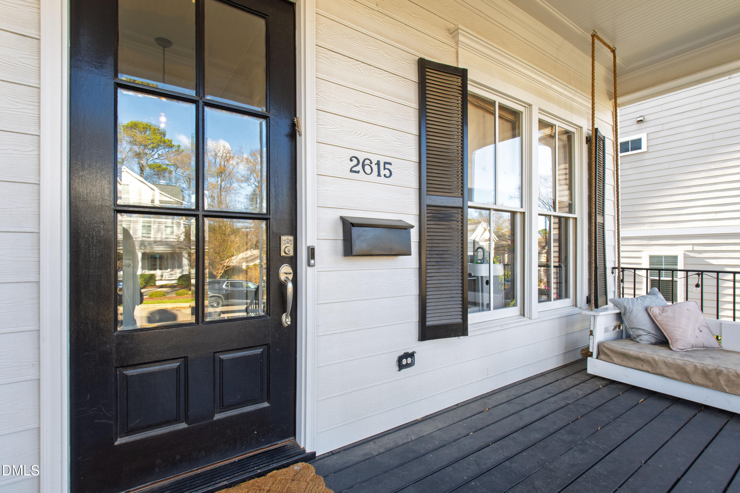 2615 Davis Street Raleigh, NC 27608 - Photo 5 of 61 a view of an entryway with wooden floor and windows
