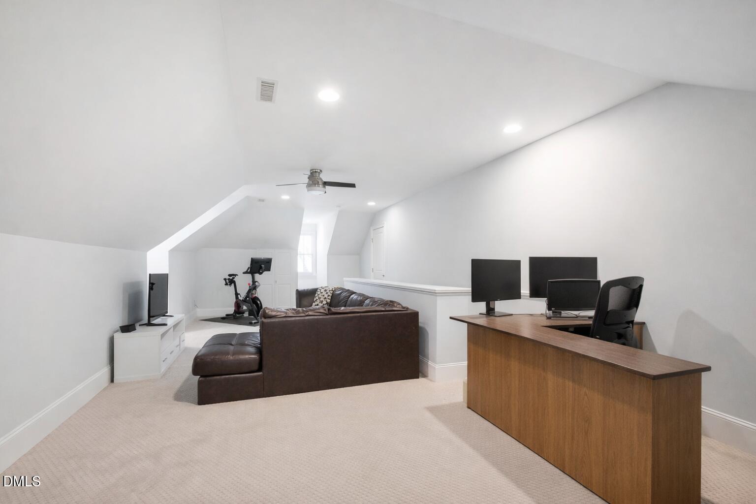 2615 Davis Street Raleigh, NC 27608 - Photo 52 of 61 a living room with furniture a flat screen tv and a window