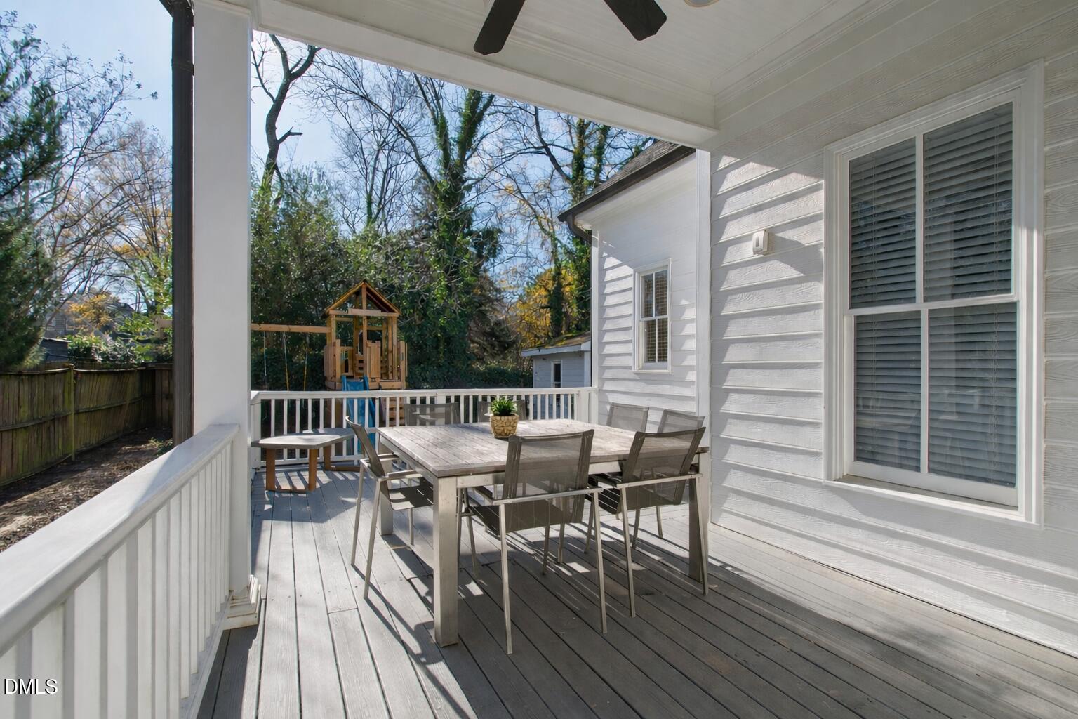 2615 Davis Street Raleigh, NC 27608 - Photo 56 of 61 a view of a deck with furniture and wooden floor