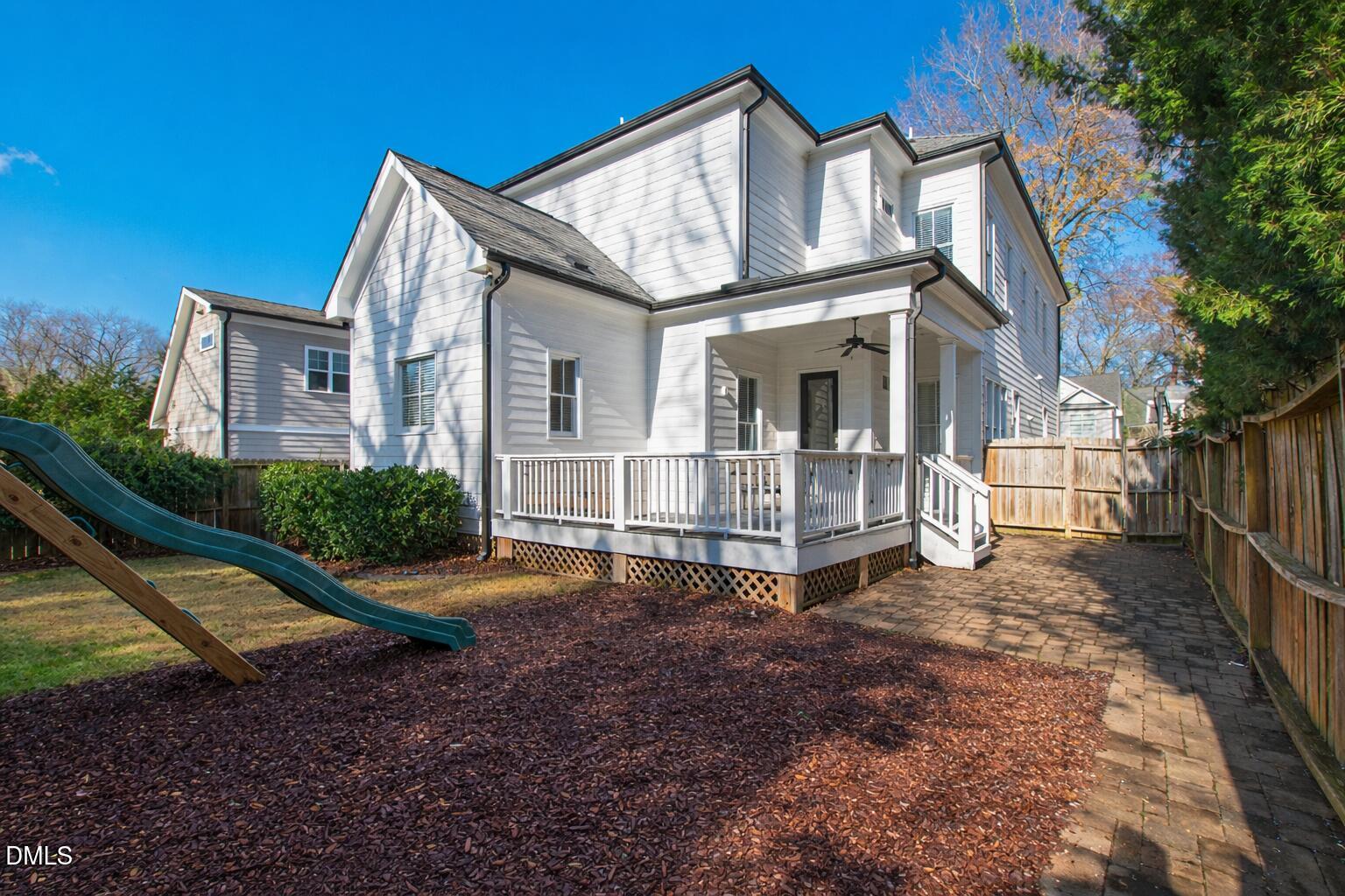 2615 Davis Street Raleigh, NC 27608 - Photo 60 of 61 a view of a house with backyard and porch