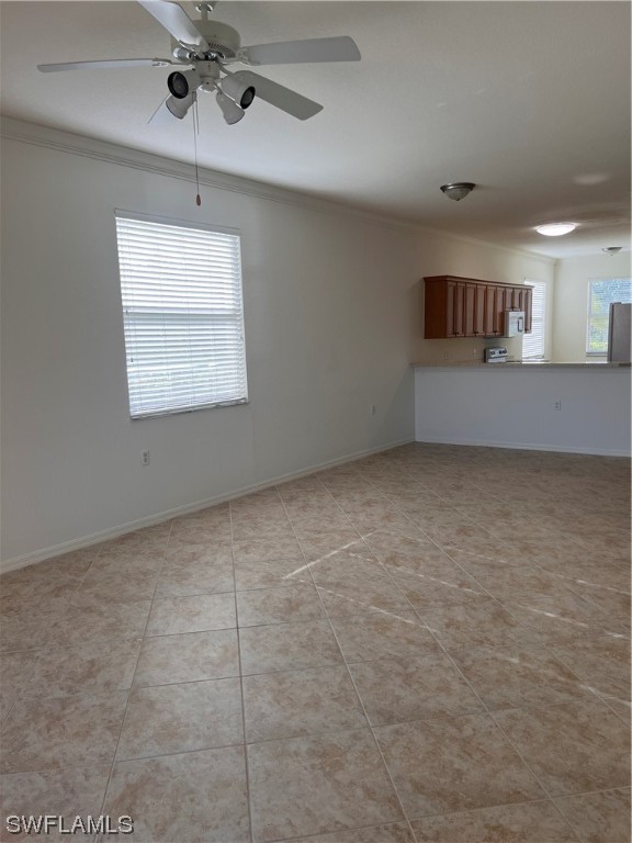8470 Kingbird Loop, Unit 1020 Estero, FL 33967 - Photo 8 of 17 a view of an empty room with a window