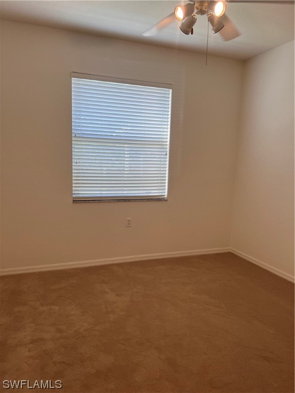 8470 Kingbird Loop, Unit 1020 Estero, FL 33967 - Photo 9 of 17 an empty room with a window
