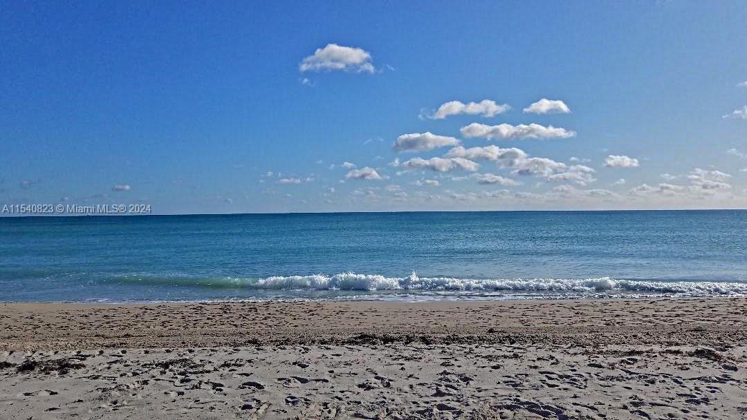 1801 South Surf Road, Unit 2E Hollywood, FL 33019 - Photo 1 of 24 a view of a big room with wooden floor