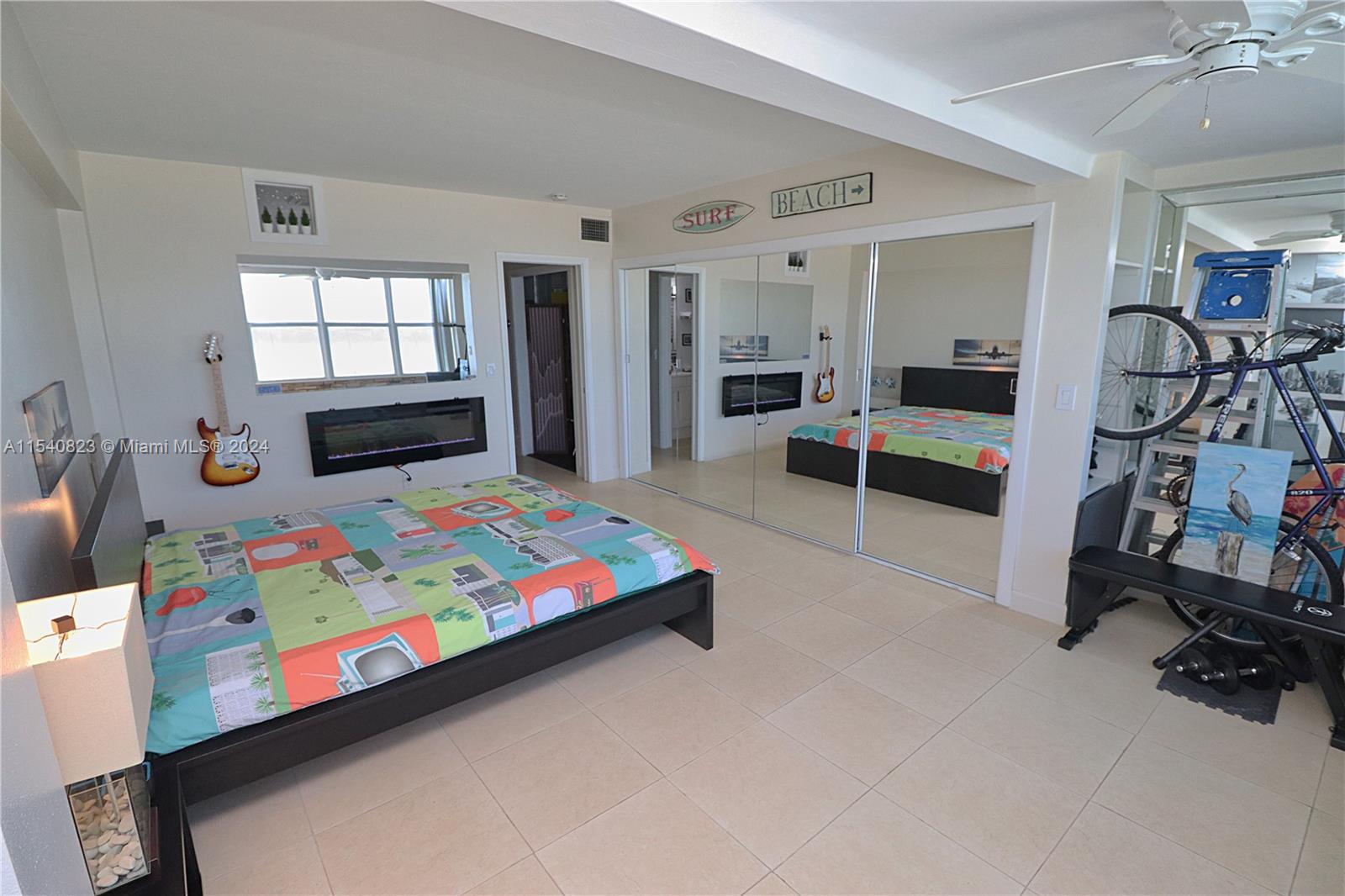 1801 South Surf Road, Unit 2E Hollywood, FL 33019 - Photo 12 of 24 a room with furniture and gym equipment