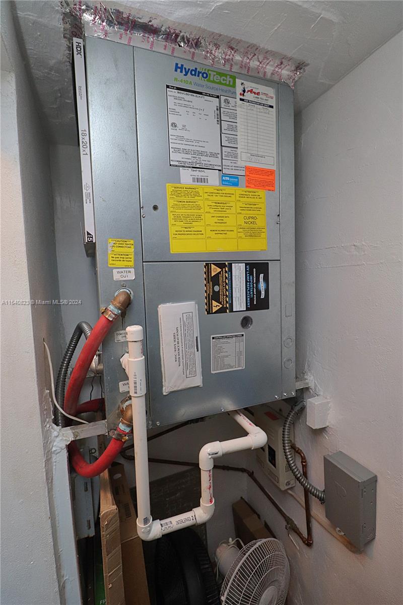 1801 South Surf Road, Unit 2E Hollywood, FL 33019 - Photo 17 of 24 a living room with furniture and a flat screen tv