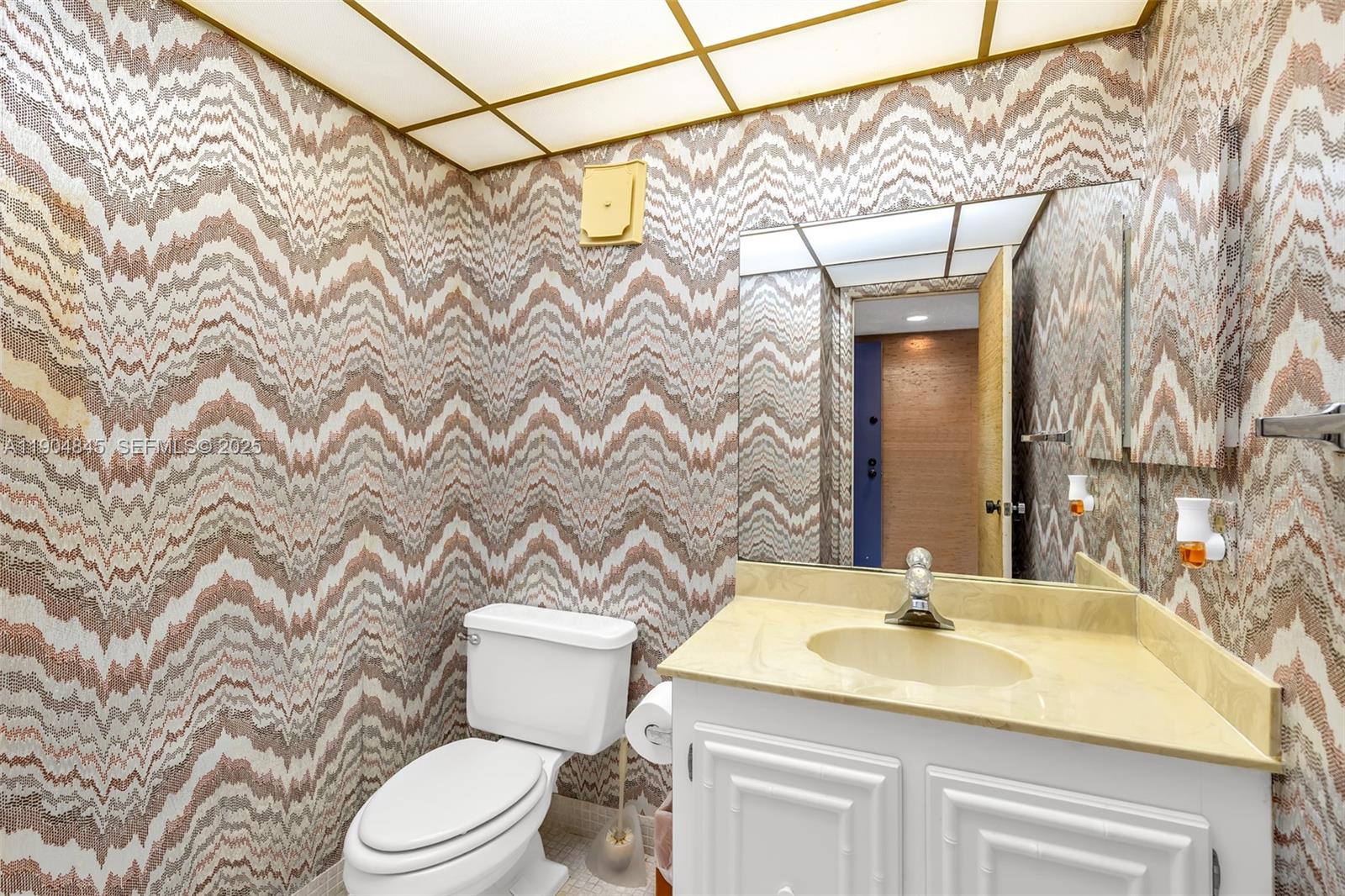 16300 Golf Club Road, Unit 408 Weston, FL 33326 - Photo 11 of 31 a bathroom with a sink toilet and shower