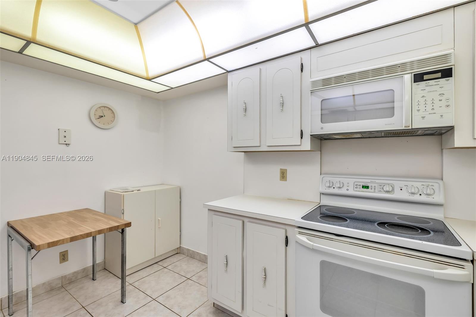 16300 Golf Club Road, Unit 408 Weston, FL 33326 - Photo 22 of 31 a utility room with sink dryer and washer