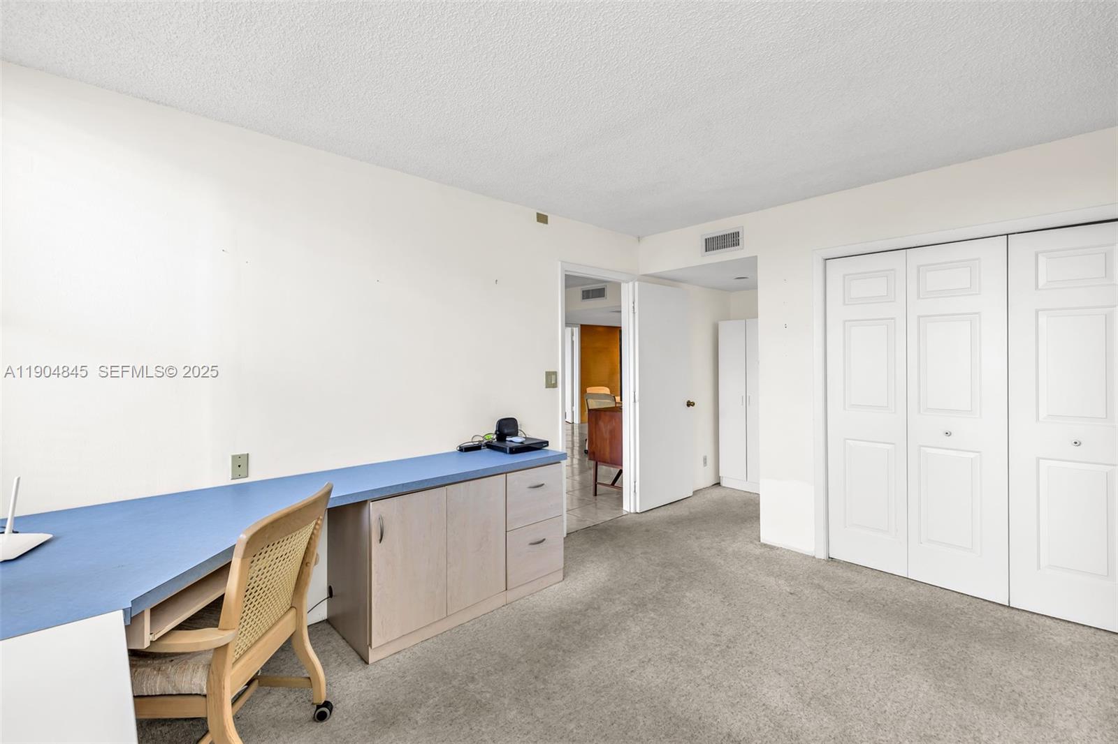 16300 Golf Club Road, Unit 408 Weston, FL 33326 - Photo 29 of 31 a view of an empty room