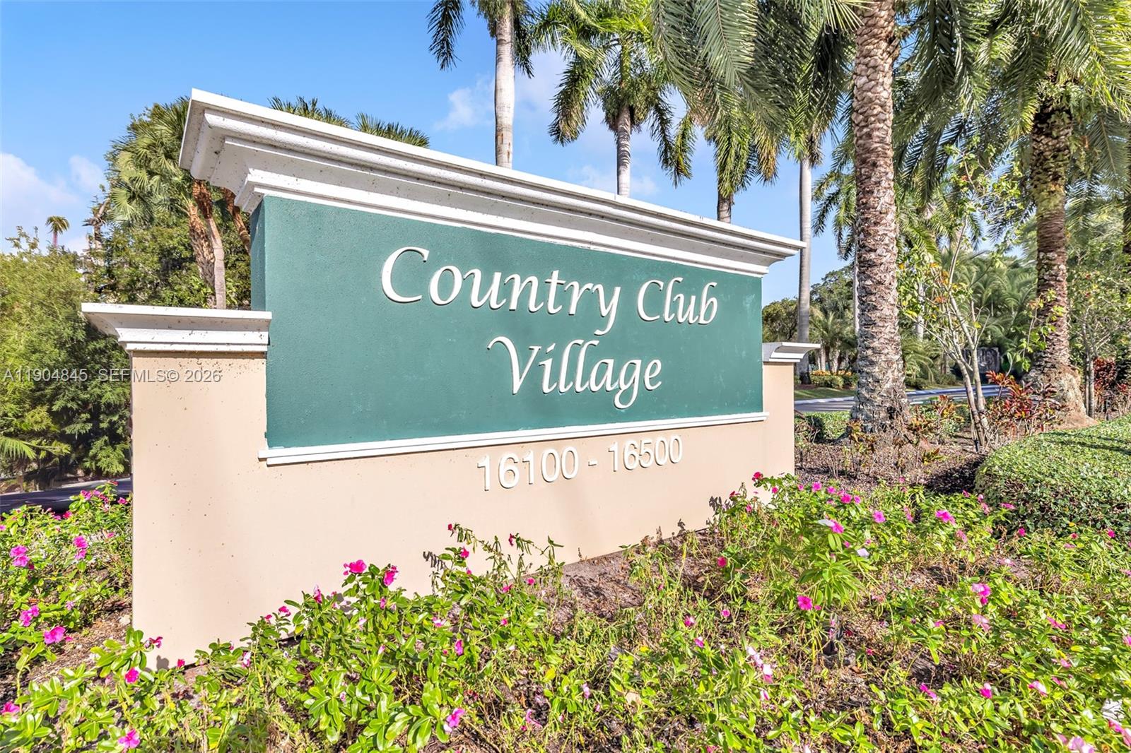 16300 Golf Club Road, Unit 408 Weston, FL 33326 - Photo 5 of 31 a sign on the side of a building