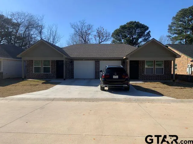 a house view with a outdoor space