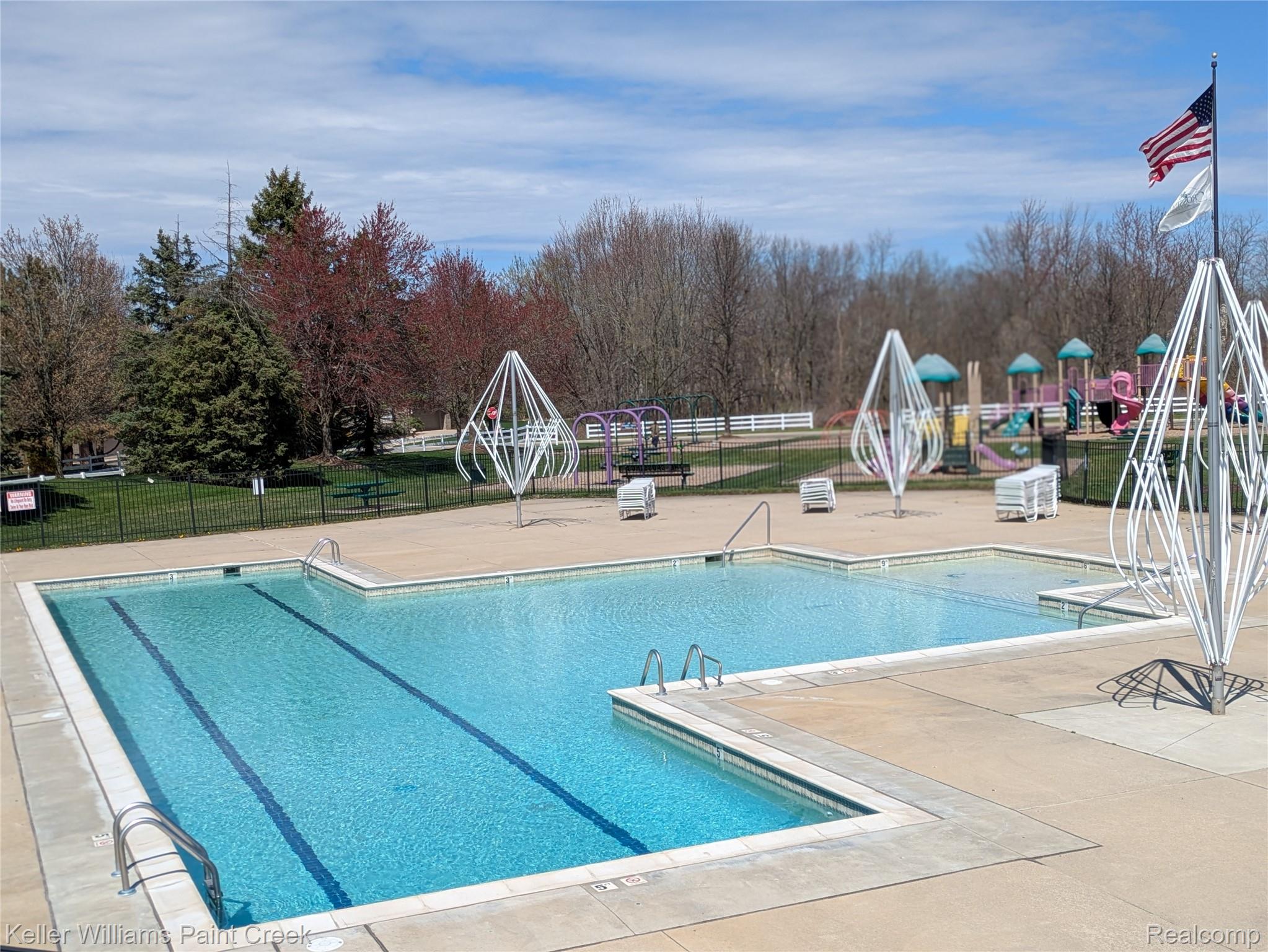 4139 Wincrest Lane Rochester, MI 48306 - Photo 27 of 34 Large community pool makes it easy to beat the heat in the summer!