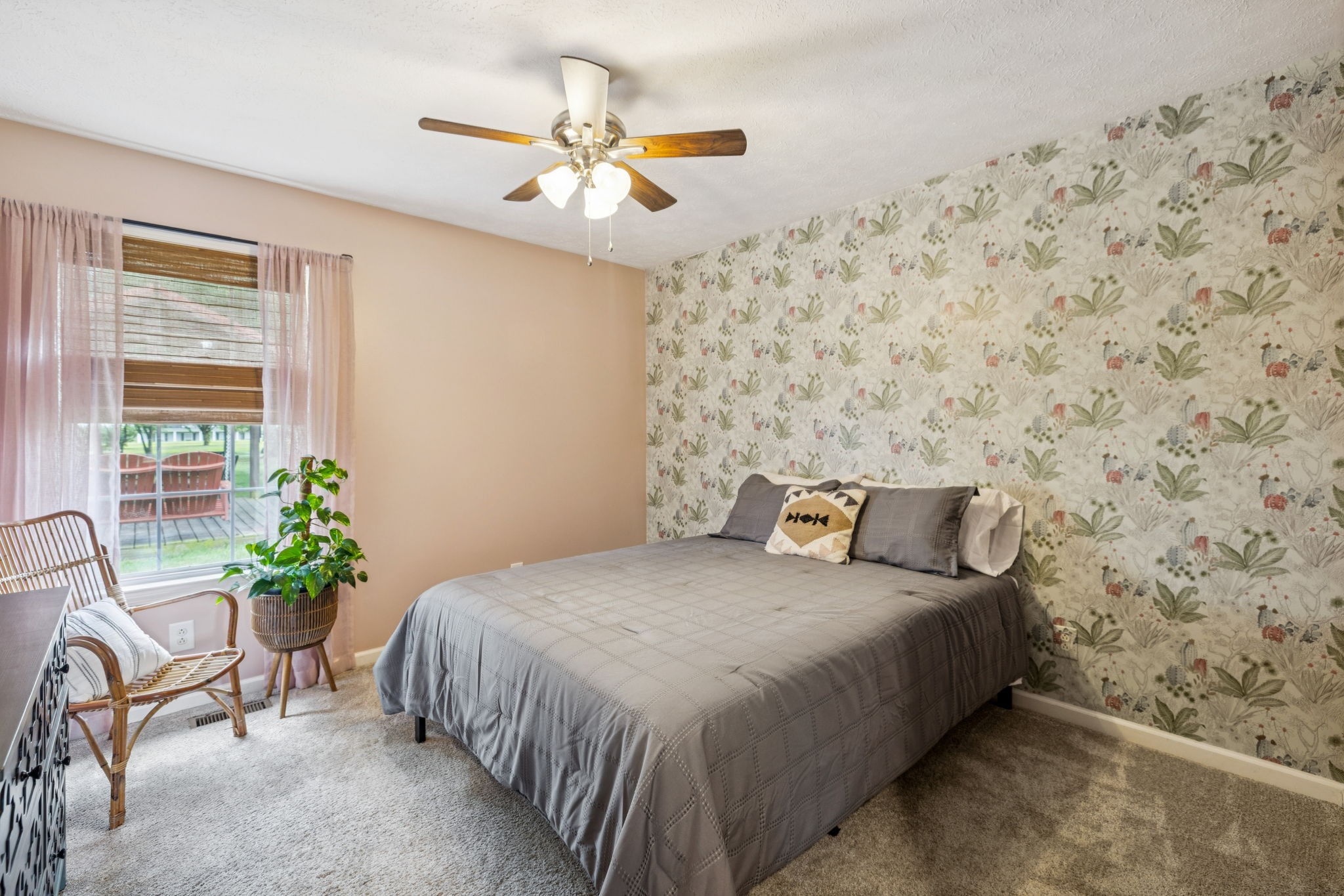 6683 East Benton Road Springfield, TN 37172 - Photo 29 of 64 a bedroom with a bed table and chair