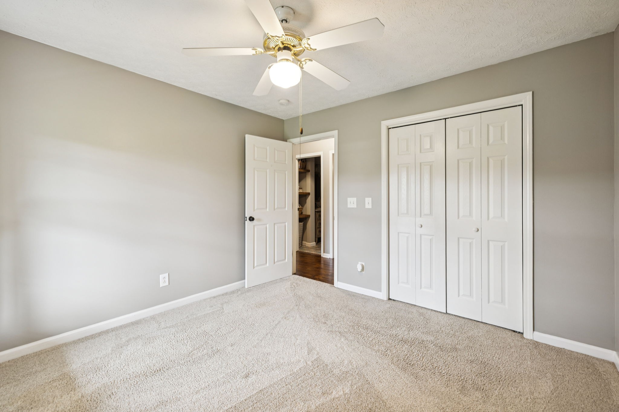 6683 East Benton Road Springfield, TN 37172 - Photo 30 of 64 an empty room with fan and a ceiling fan