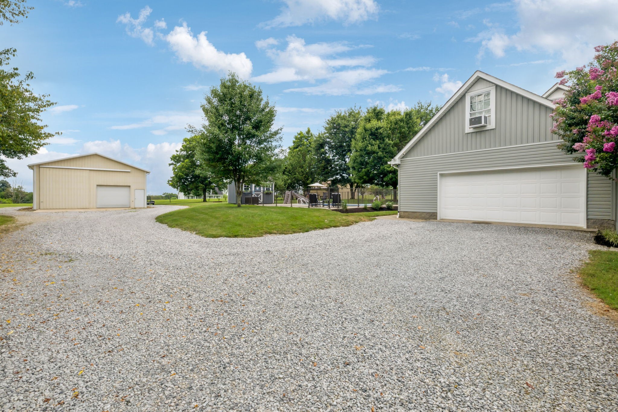 6683 East Benton Road Springfield, TN 37172 - Photo 48 of 64 a view of a house with a yard and garage
