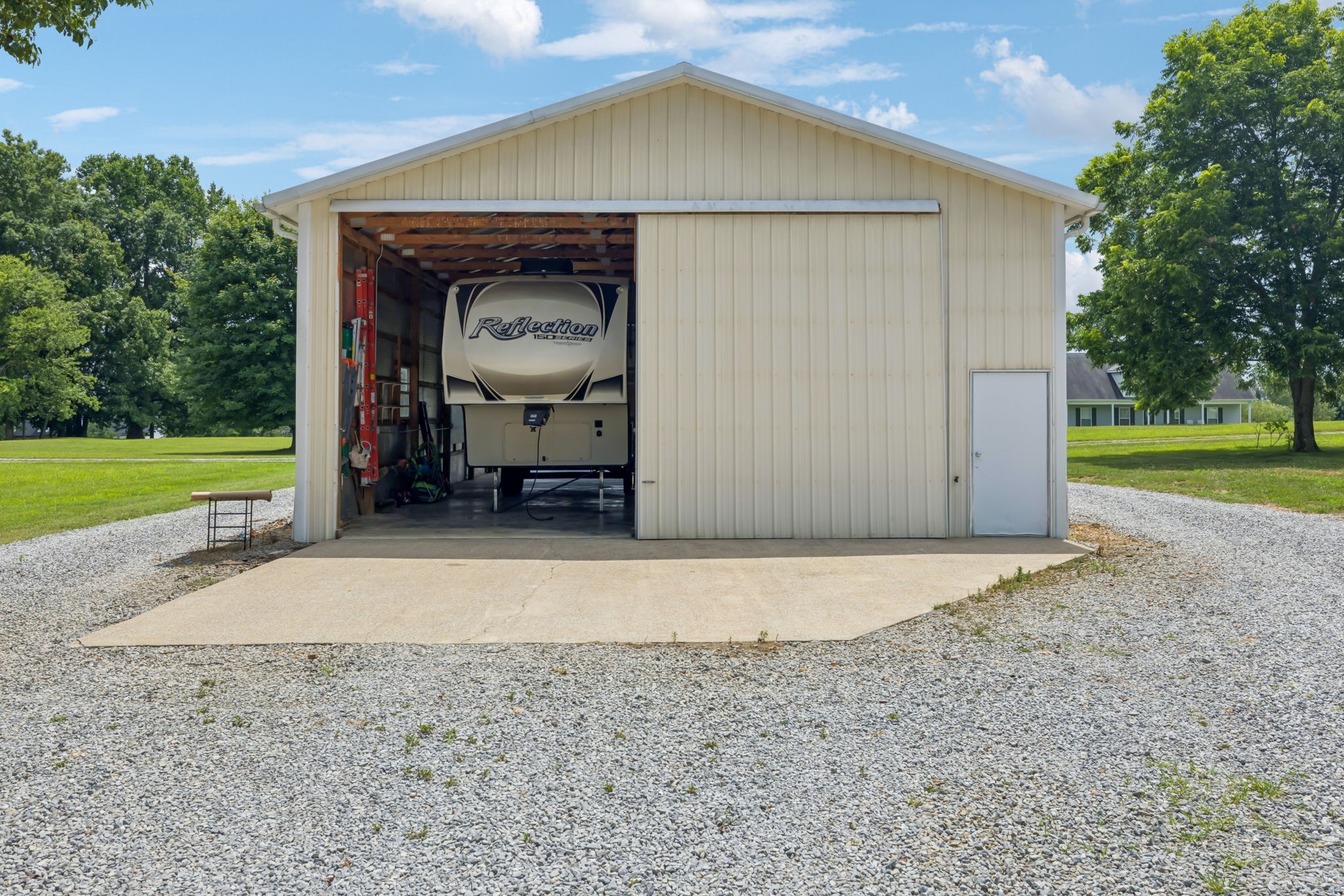 6683 East Benton Road Springfield, TN 37172 - Photo 50 of 64 a view of a house with a yard