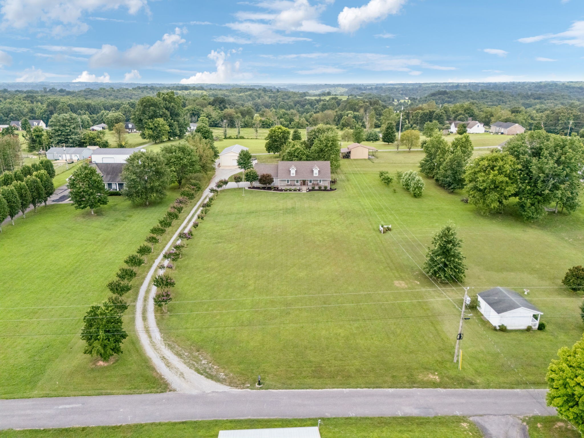 6683 East Benton Road Springfield, TN 37172 - Photo 60 of 64 a view of a lake with a yard