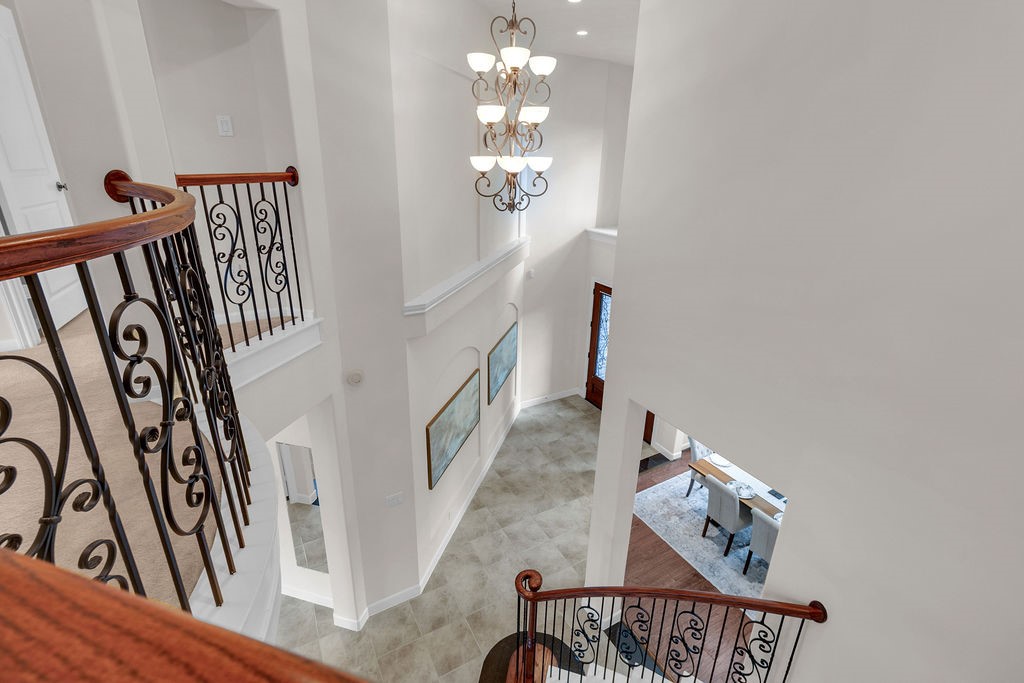 7306 Starflower Katy, TX 77494 - Photo 45 of 50 a view of a livingroom with furniture staircase and front door