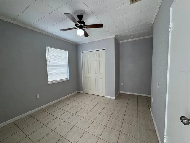 a view of an empty room and window