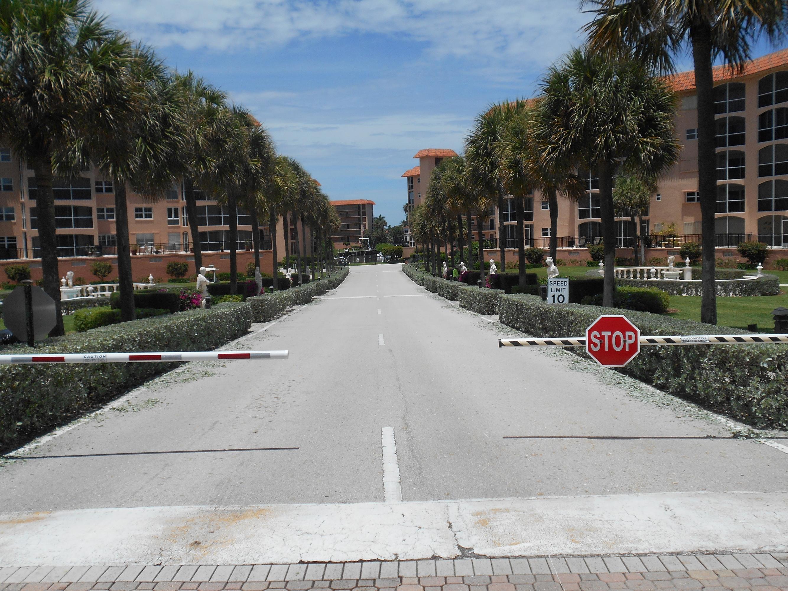 2871 North Ocean Boulevard, Unit D220 Boca Raton, FL 33431 - Photo 101 of 133 sr_looking_down_driveway_2