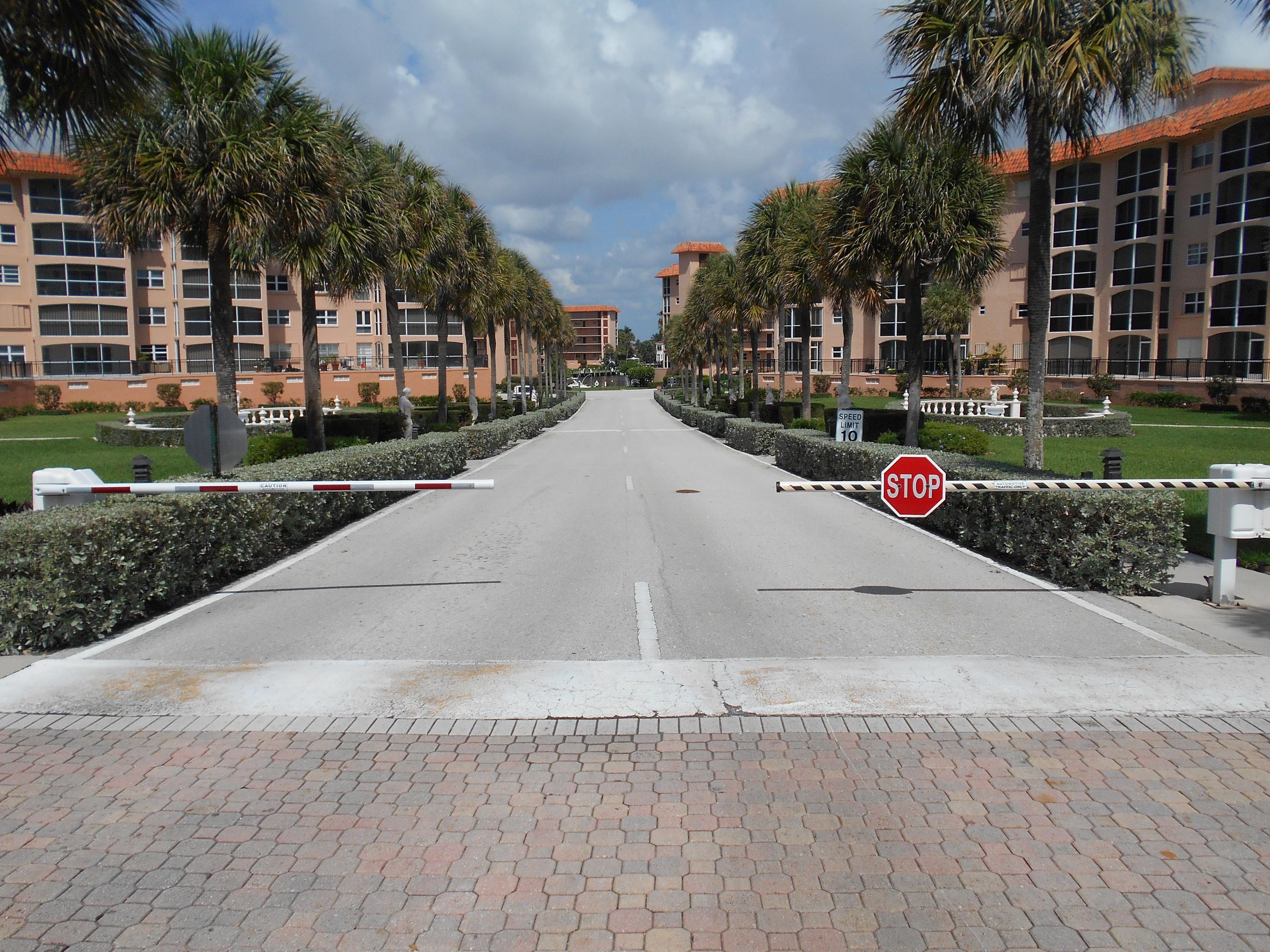2871 North Ocean Boulevard, Unit D220 Boca Raton, FL 33431 - Photo 9 of 133 002 sr_driveway gate is manned 24/7