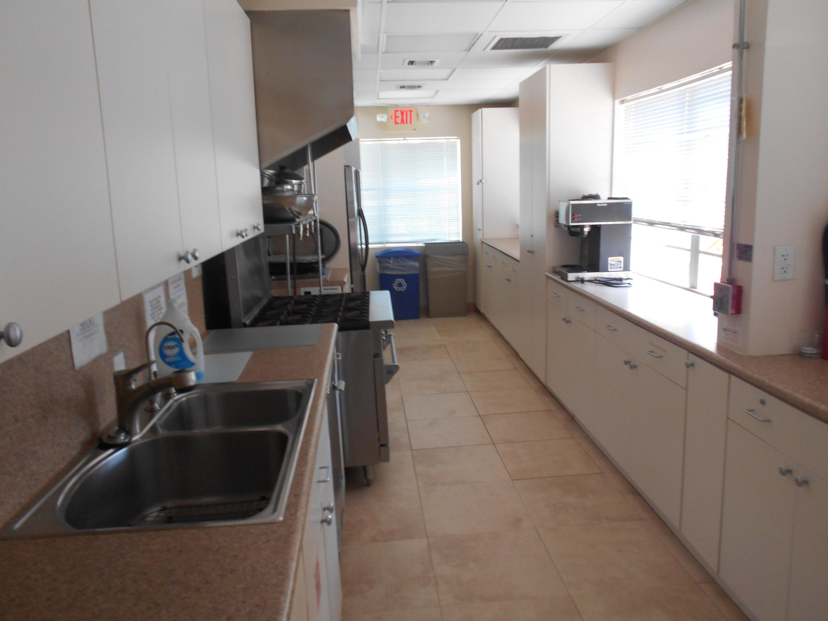 2871 North Ocean Boulevard, Unit D220 Boca Raton, FL 33431 - Photo 91 of 133 newly_remodeled_clubhouse_kitchen