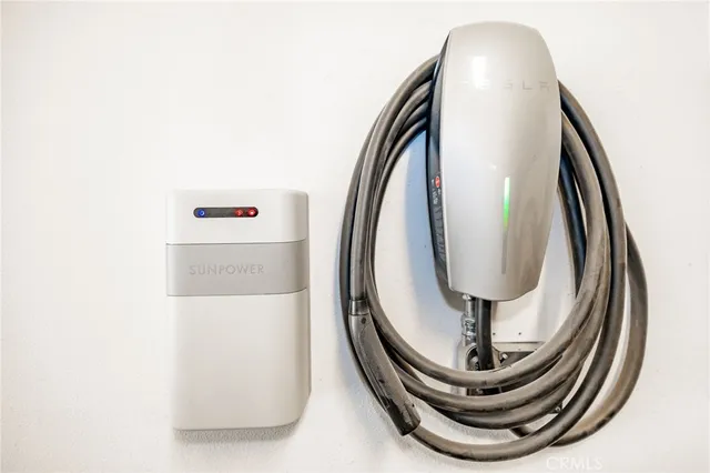 a view of a chairs and table in the patio