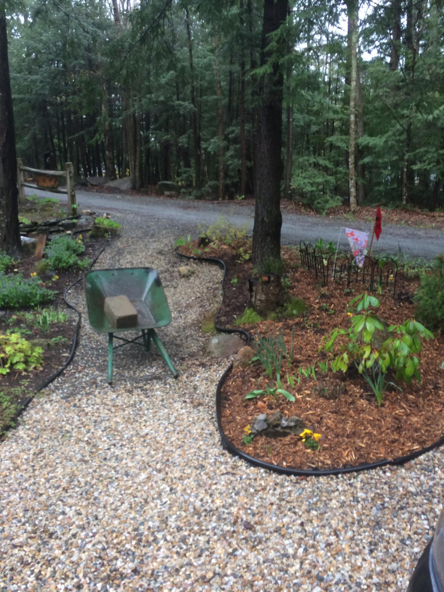 2-35 759 North Main Road Otis, MA 01253 - Photo 3 of 24 a view of a backyard with fountain
