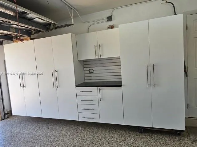 a view of an empty room with a sink