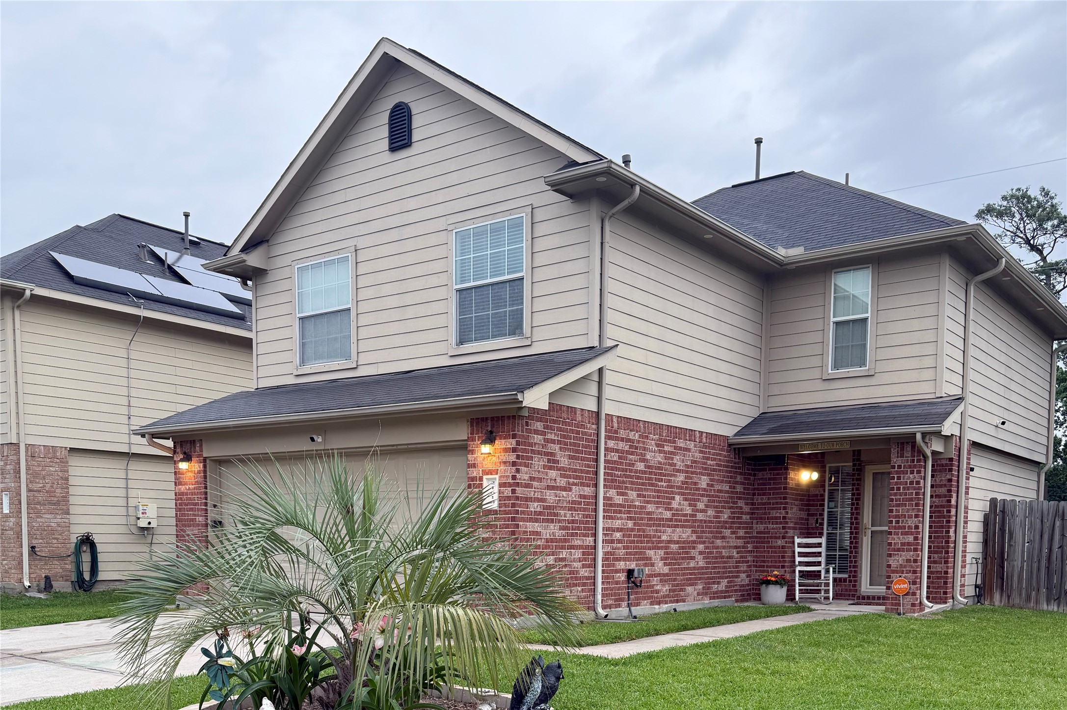 Corner lot charm with a welcoming front porch and extra space to enjoy