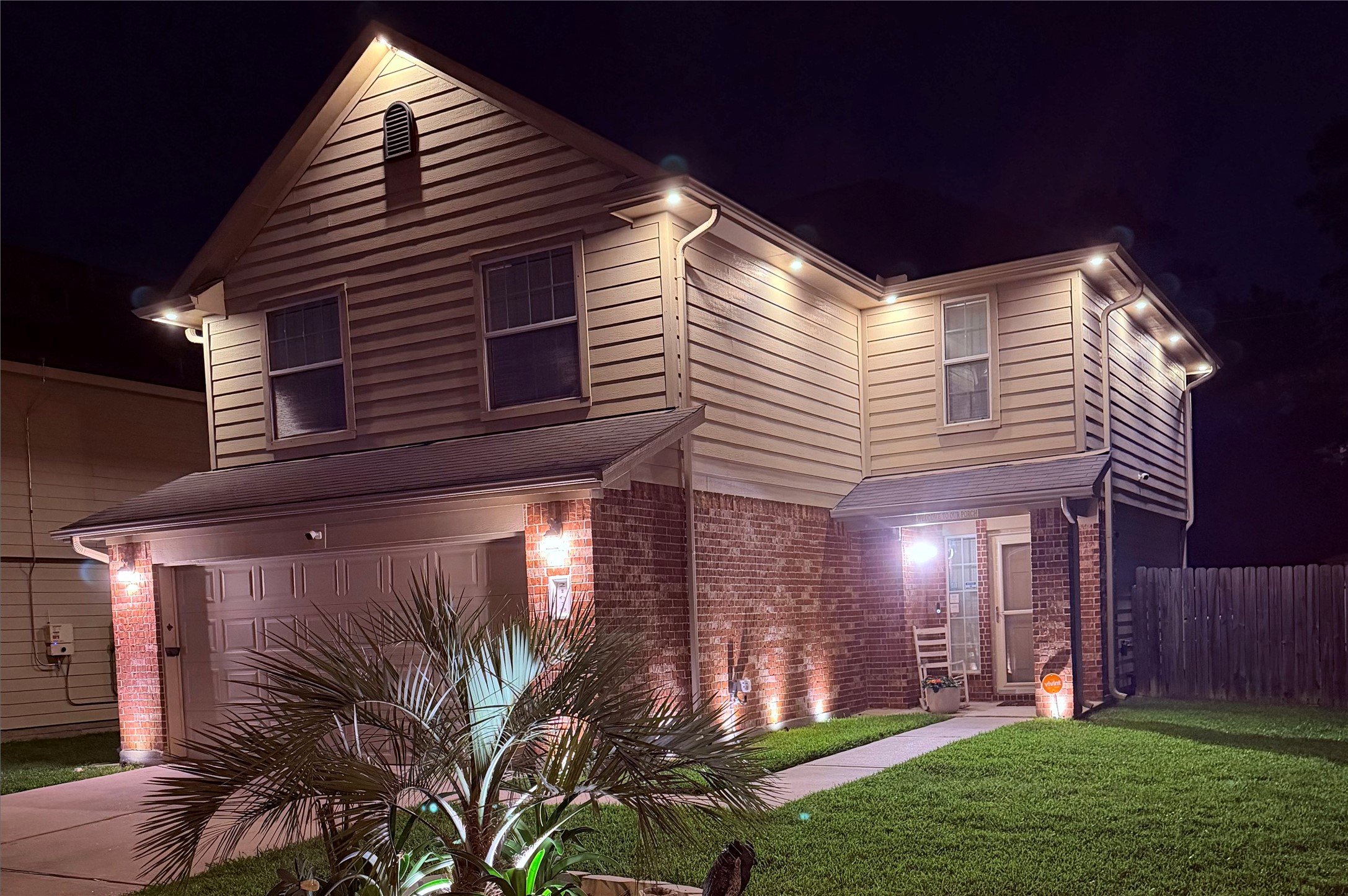 21610 Falvel Misty Drive Spring, TX 77388 - Photo 28 of 28 4” 3k warm white recessed lights installed along the roof eaves with smart dimmer switch and app accessibility.