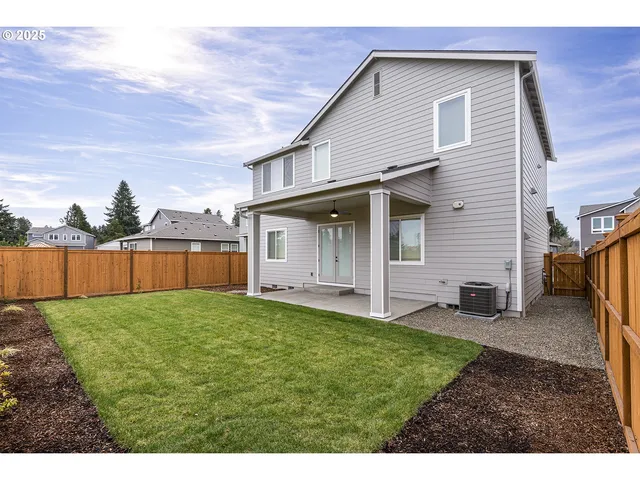 a view of a back yard of the house