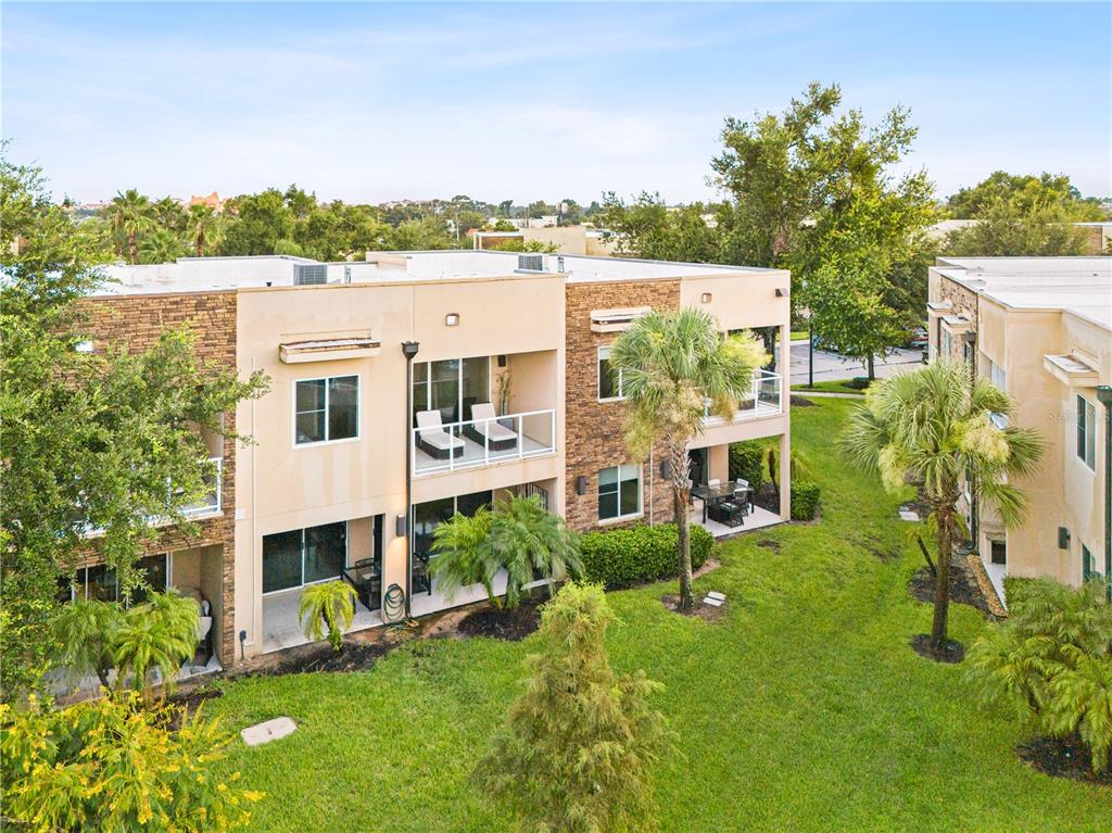 7657 Amazonas Street Kissimmee, FL 34747 - Photo 27 of 53 a view of a house with a yard