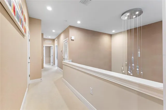 a view of a house with backyard and porch