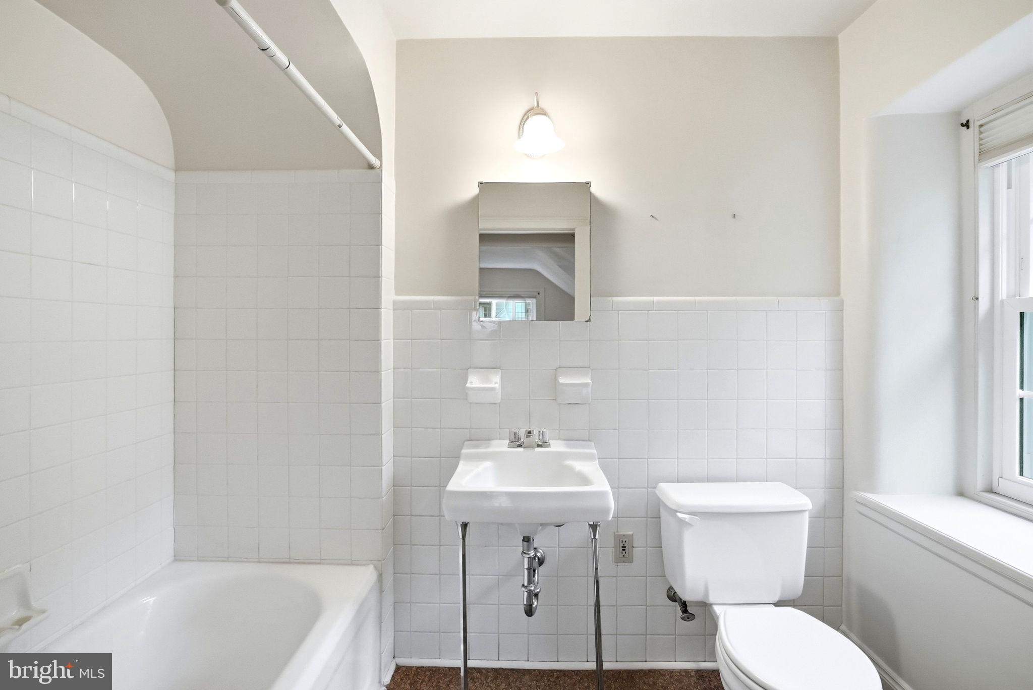 419 Riverview Road Swarthmore, PA 19081 - Photo 40 of 70 a bathroom with a sink toilet and shower