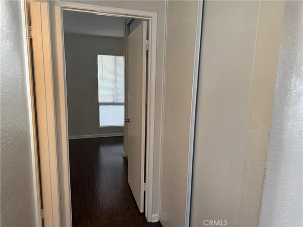 a view of a livingroom with wooden floor