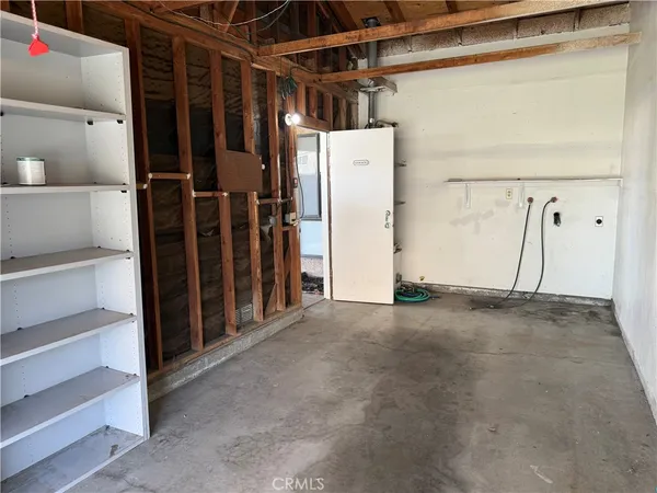 a view of a room with an empty space